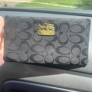 Coach Black Wallet with Gold Emblem
